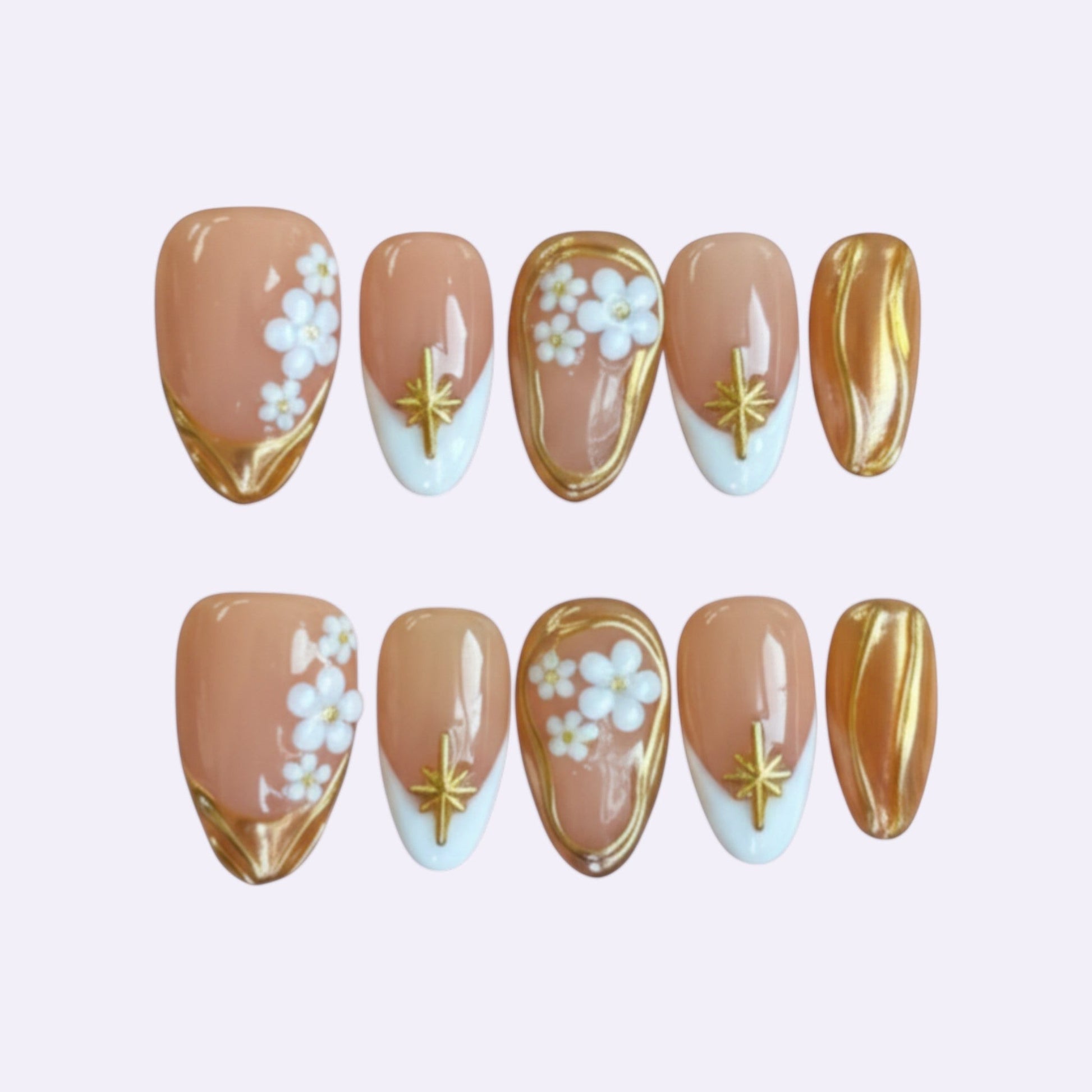 PearlFizzy Amber Floral Charm press-on nails: nude base, white flowers, gold accents, French tip with star.
