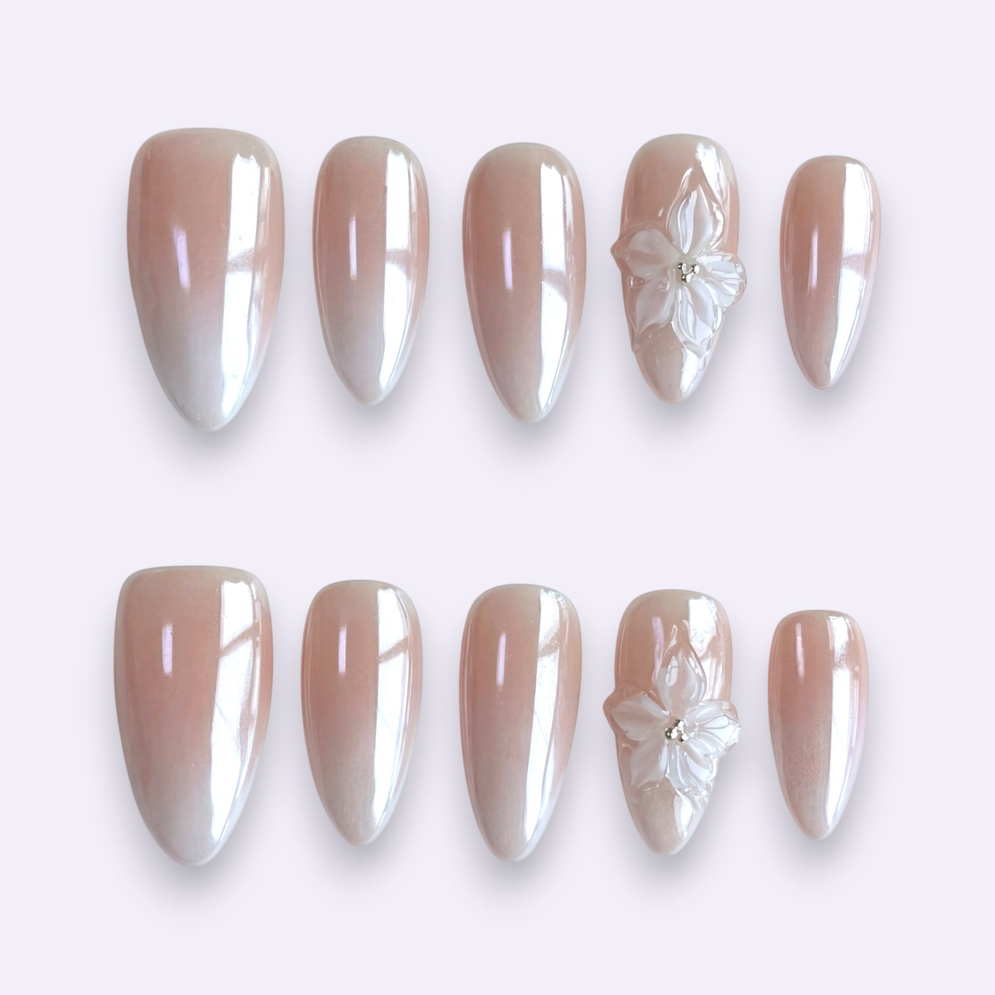 PearlFizzy Glazed Aurora handmade press-on nails with iridescent pearlescent finish and 3D transparent flowers.