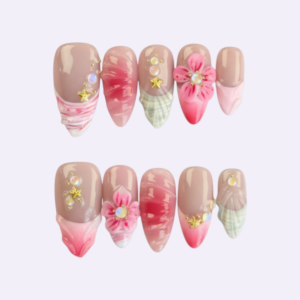 PearlFizzy ballet slipper pink press-on nails with pink & white marble, 3D floral, gold stars, pearls & French tips.